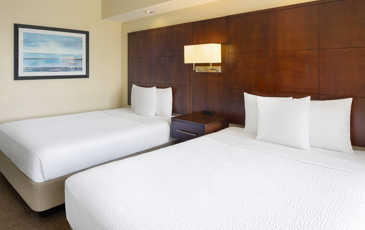 Habitación para 4 personas en Ramada Plaza by Wyndham Orlando Resort & Suites Intl Drive, Orlando